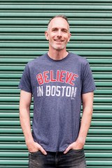 Photo of Chris Wrenn wearing a shirt that says Believe in Boston